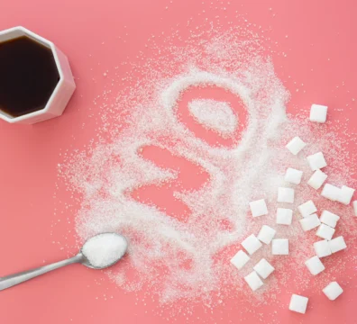 word-no-made-sugar-cup-coffee-pink-background-flat-lay